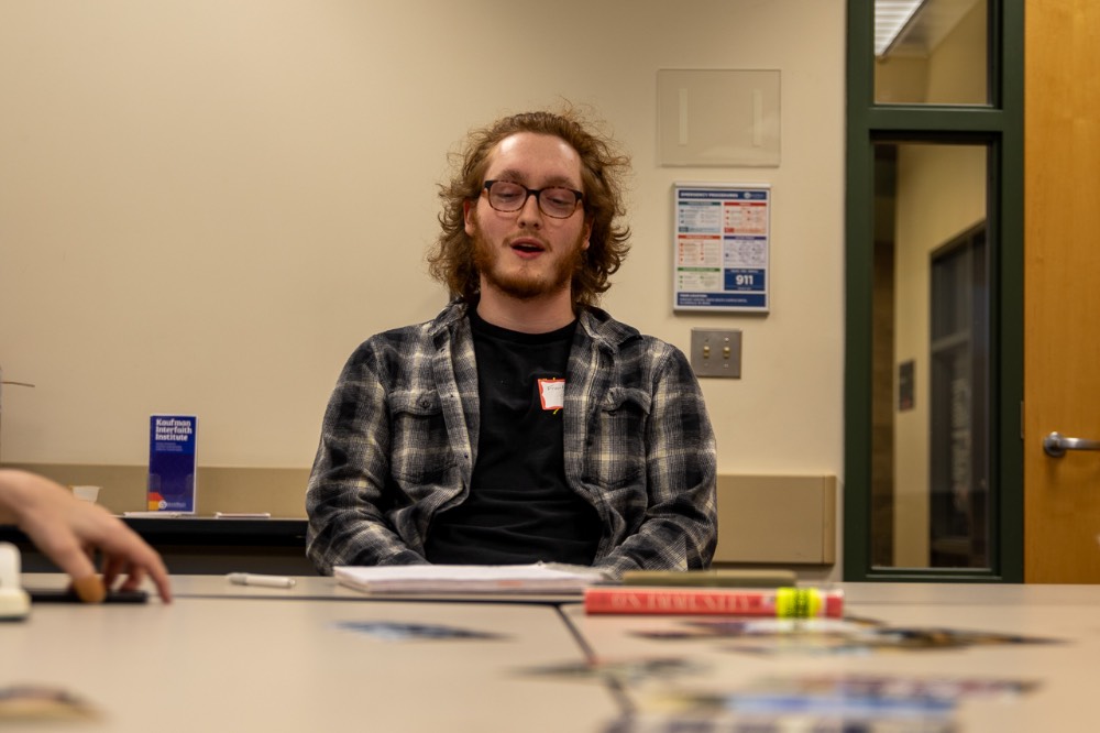 Foregrounded shot of table discussion